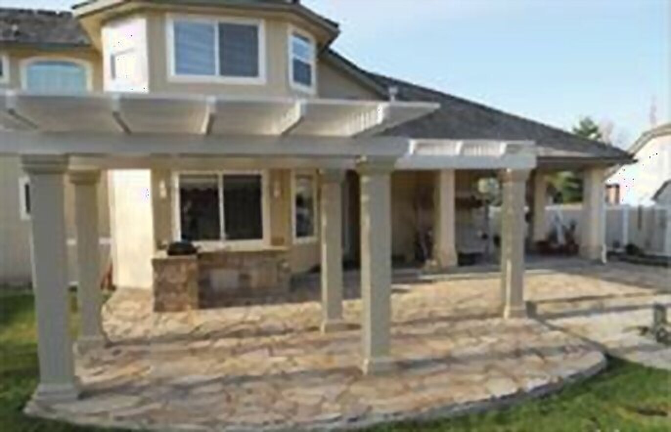 After: finished stone patio and outdoor living area