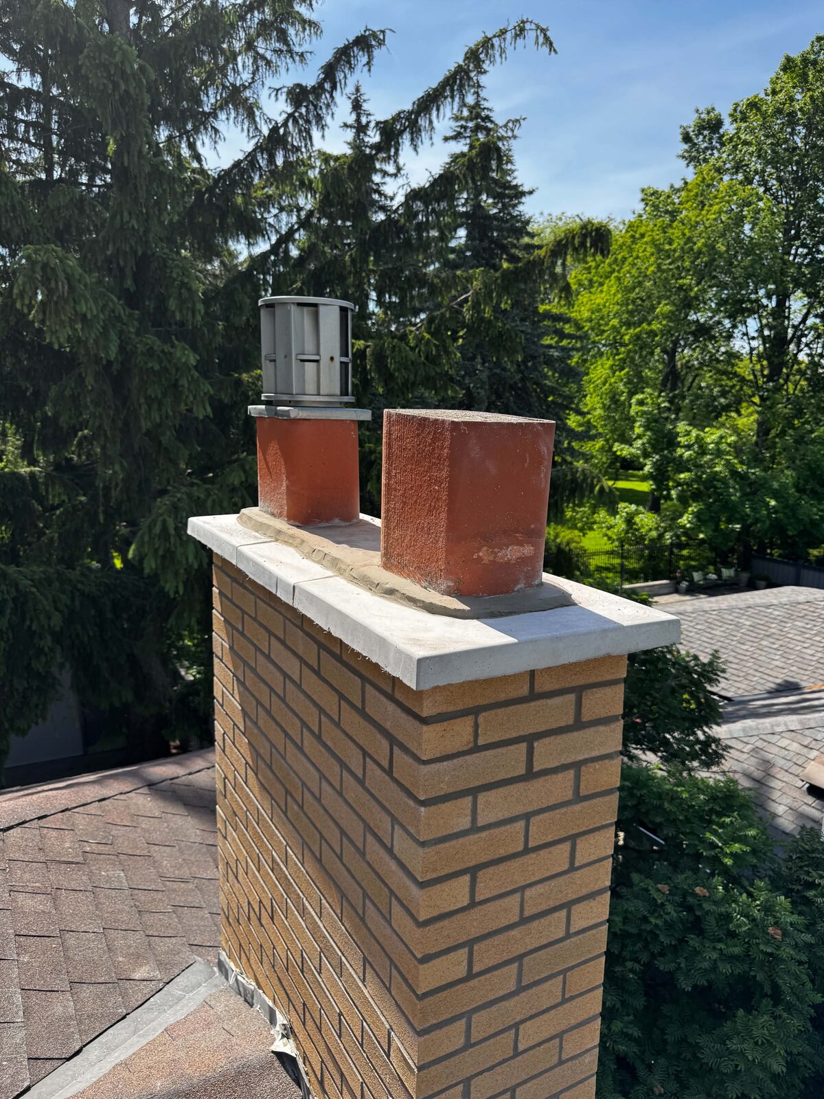 Finished chimney with clay flue pots near Bloor West Village