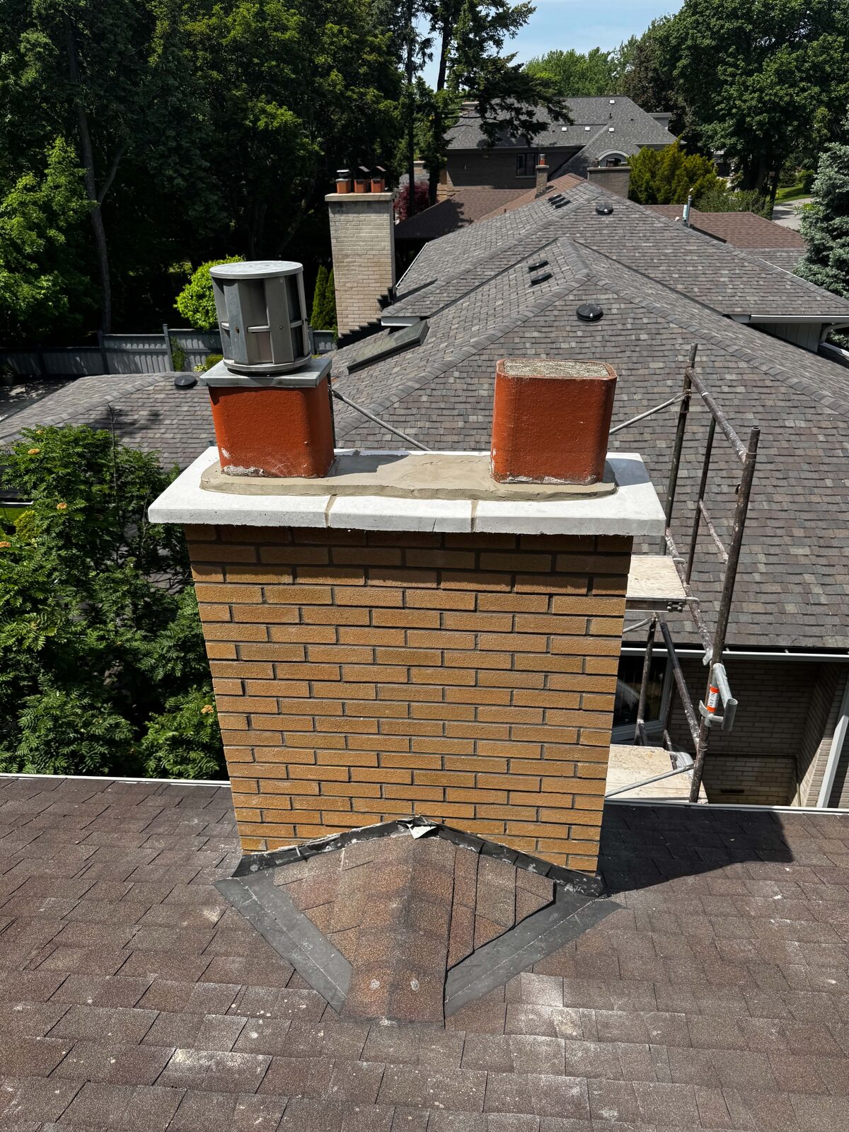 Yellow-brick chimney rebuild with new crown, Etobicoke