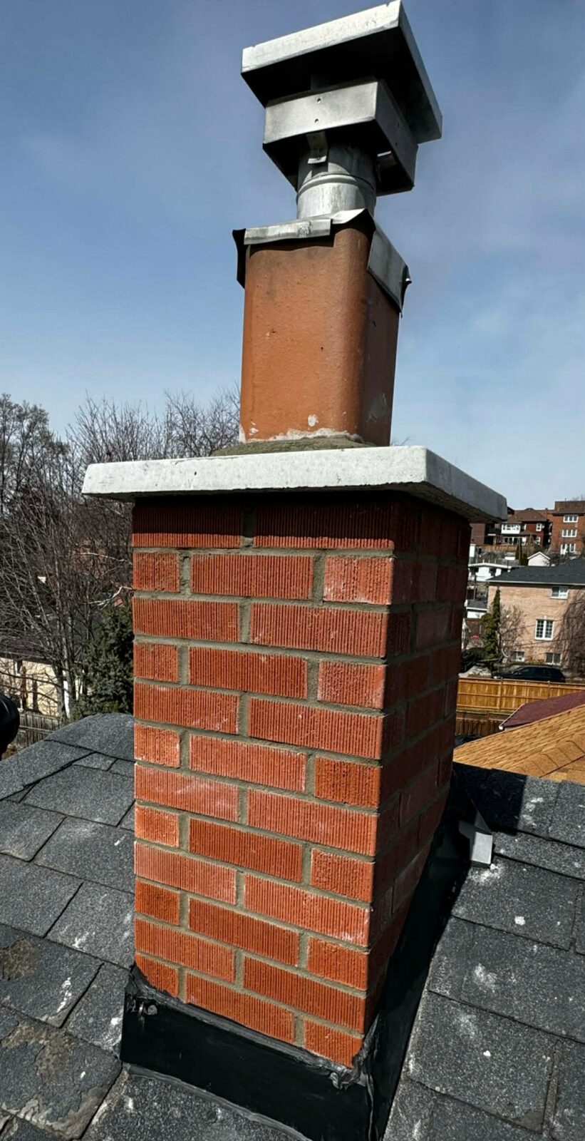 Red-brick chimney rebuild with new cap