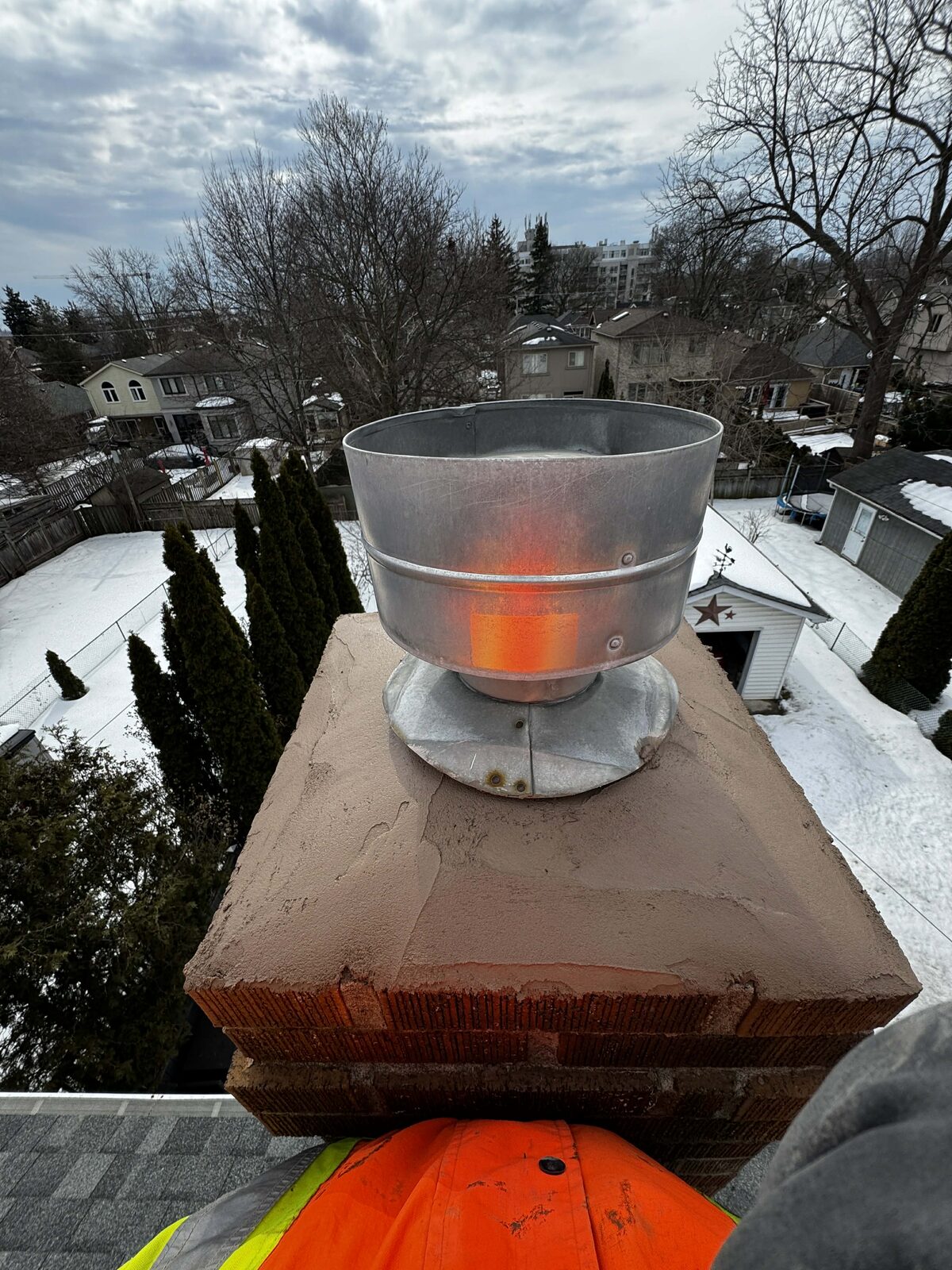 Repaired chimney with new vent cap