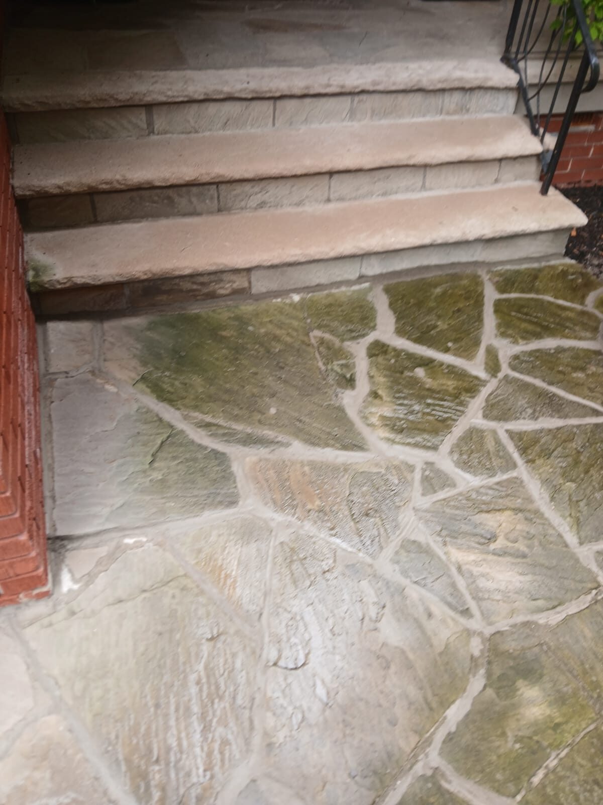 Flagstone landing and cut-stone steps