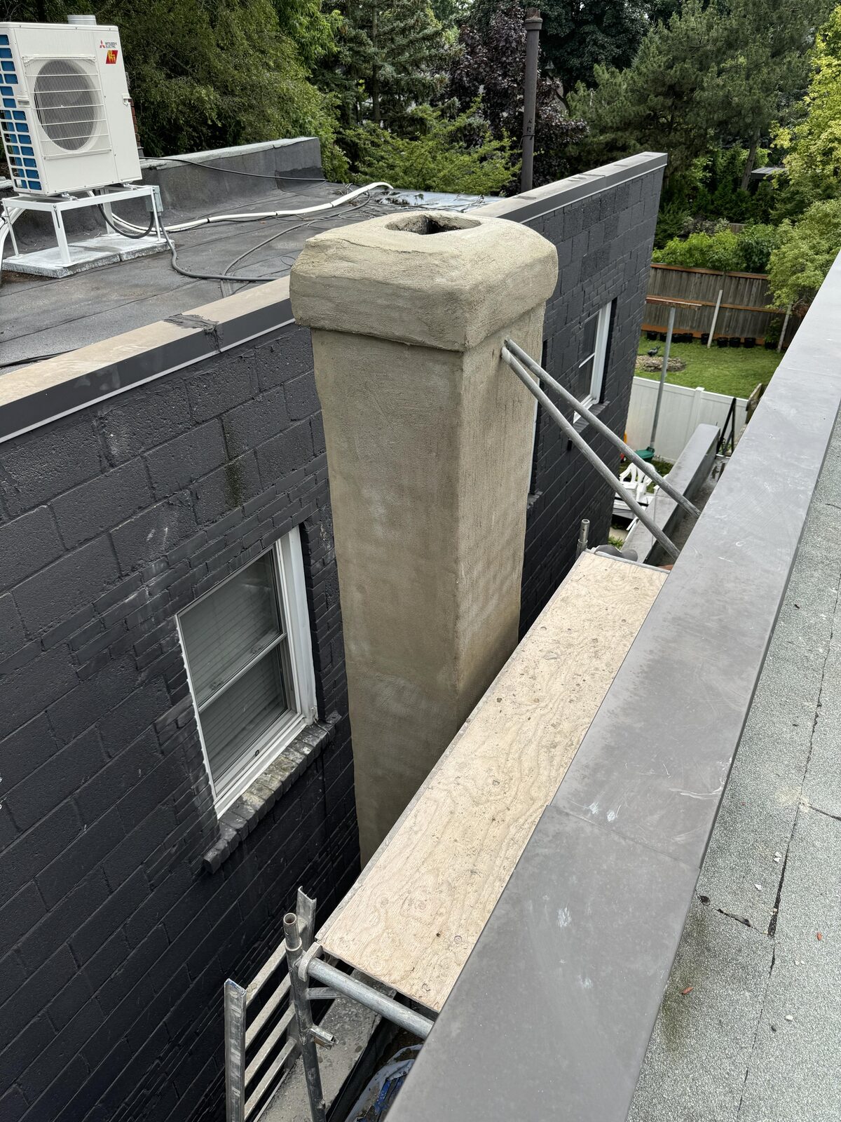 Parged chimney on a west Toronto home