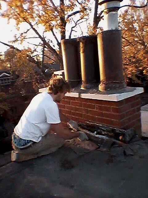 Greg Krolicki at work on a chimney