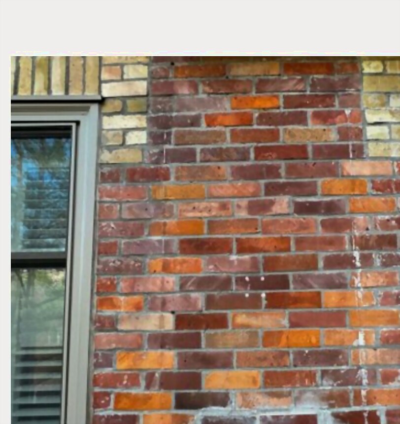 Brick and stone facade restored by Krolicki Masonry, homeowner review photo